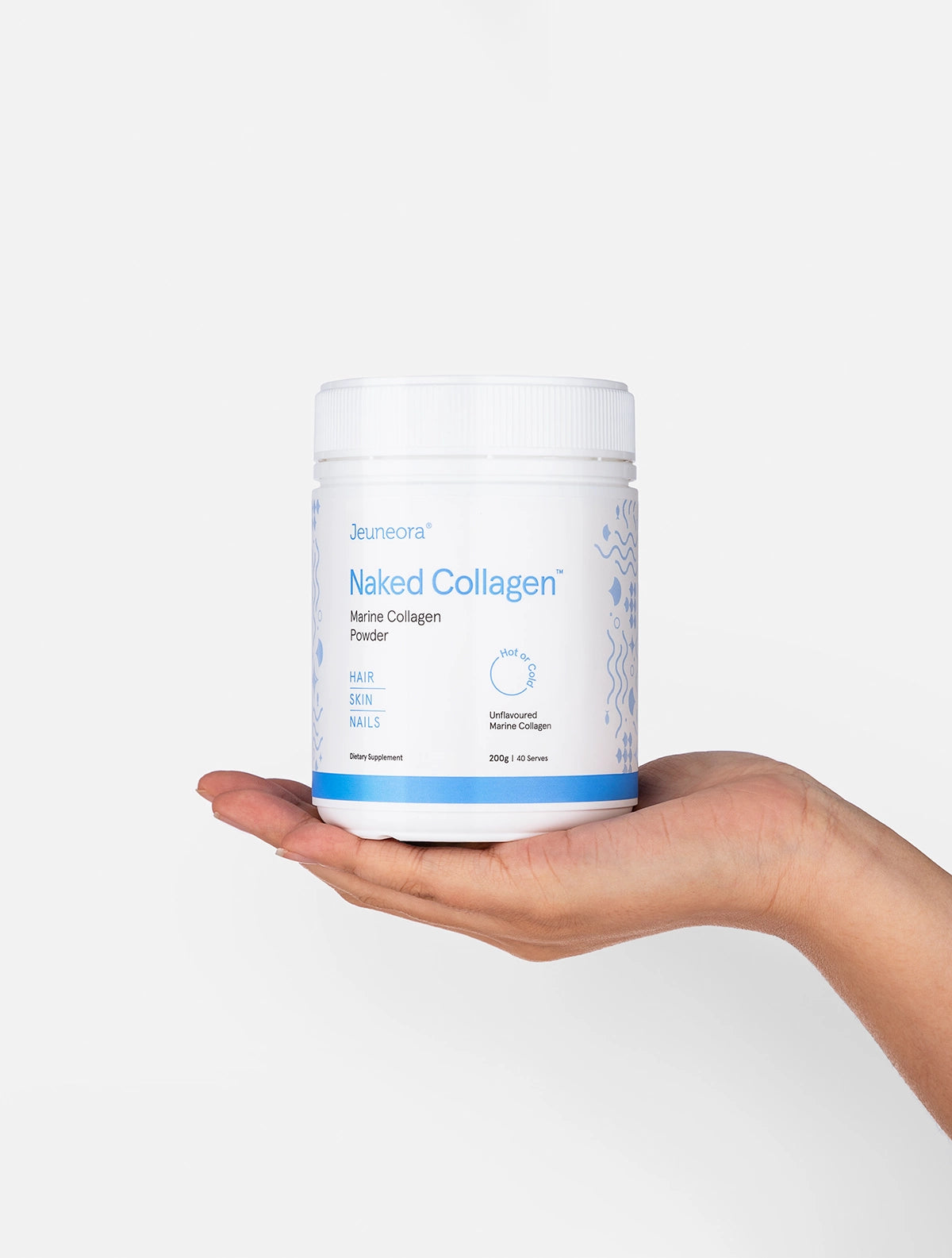 Hand holding Naked Collagen™ Marine Collagen Powder