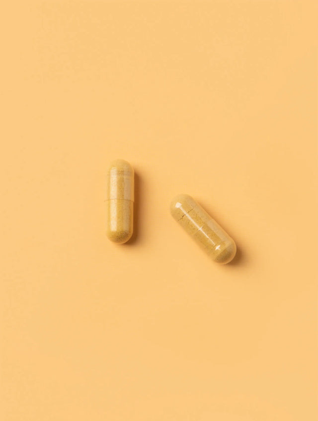 Beauty Well Super Capsules on yellow background