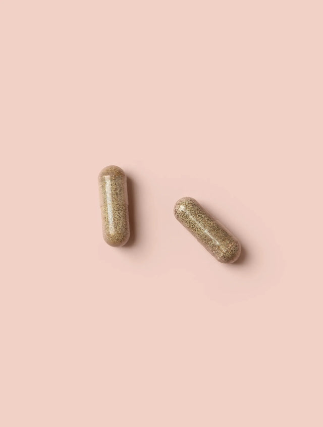 Beauty Boost Vegan Collagen Activator Capsules on pink background