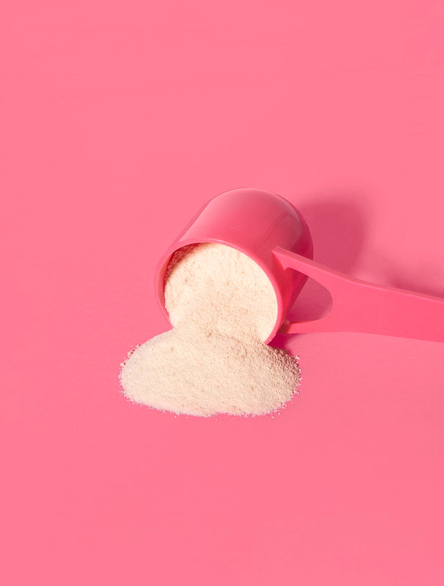 Renew+® Marine Collagen Super Powder scoop on pink background