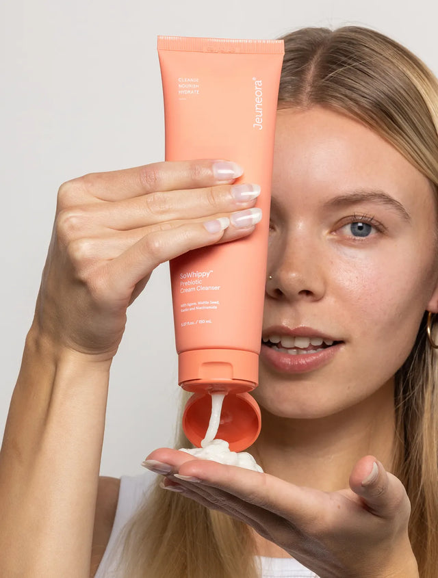 Model squeezing product from tube SoWhippy™ Prebiotic Cream Cleanser